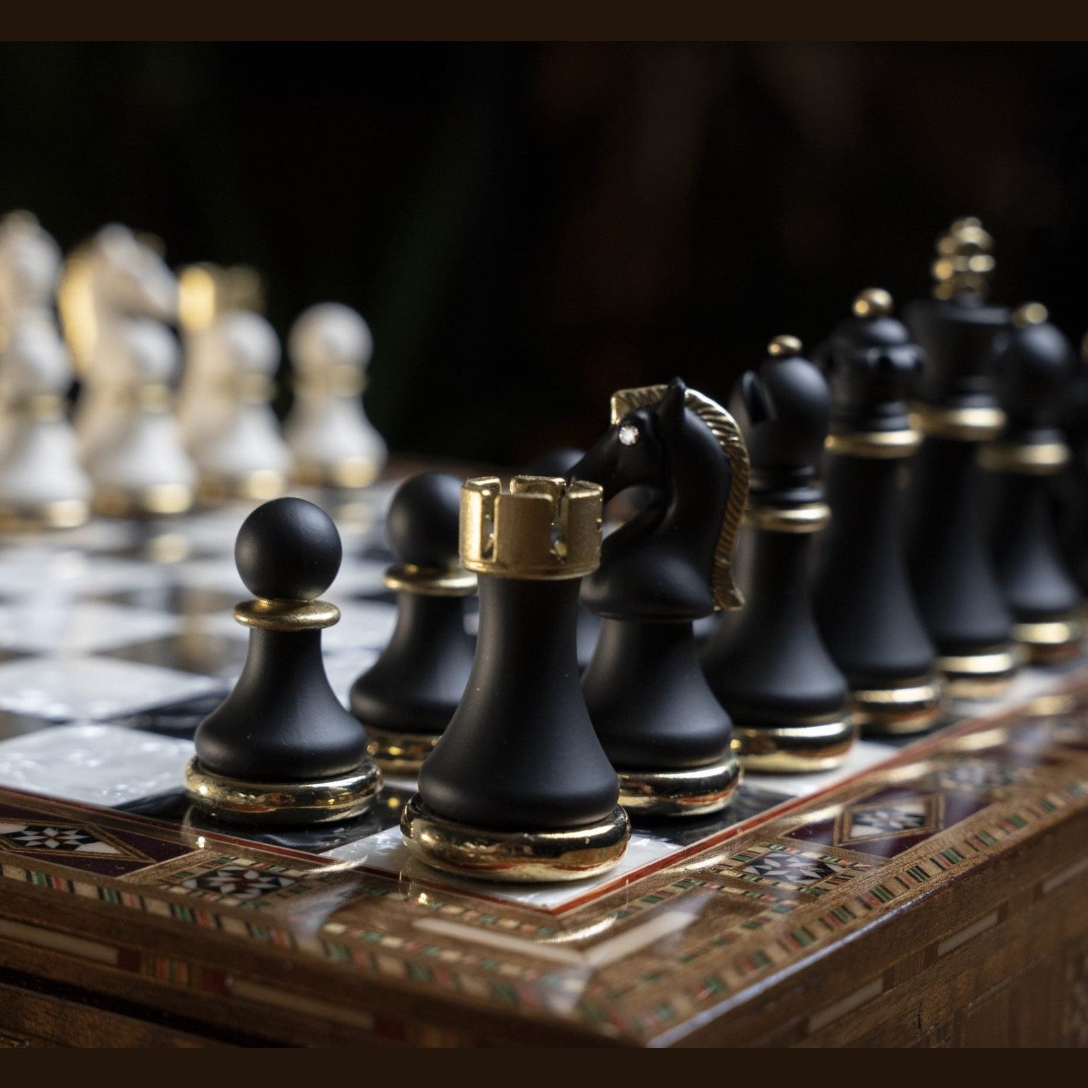 Luxurious walnut chess set with gold‑silver pieces in detail - Chess workshop